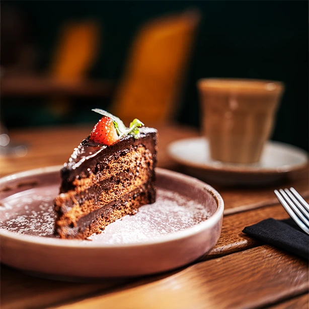 A tempting selection of desserts at La Mela Bistro, offering a sweet end to your Mediterranean meal in Hackney.