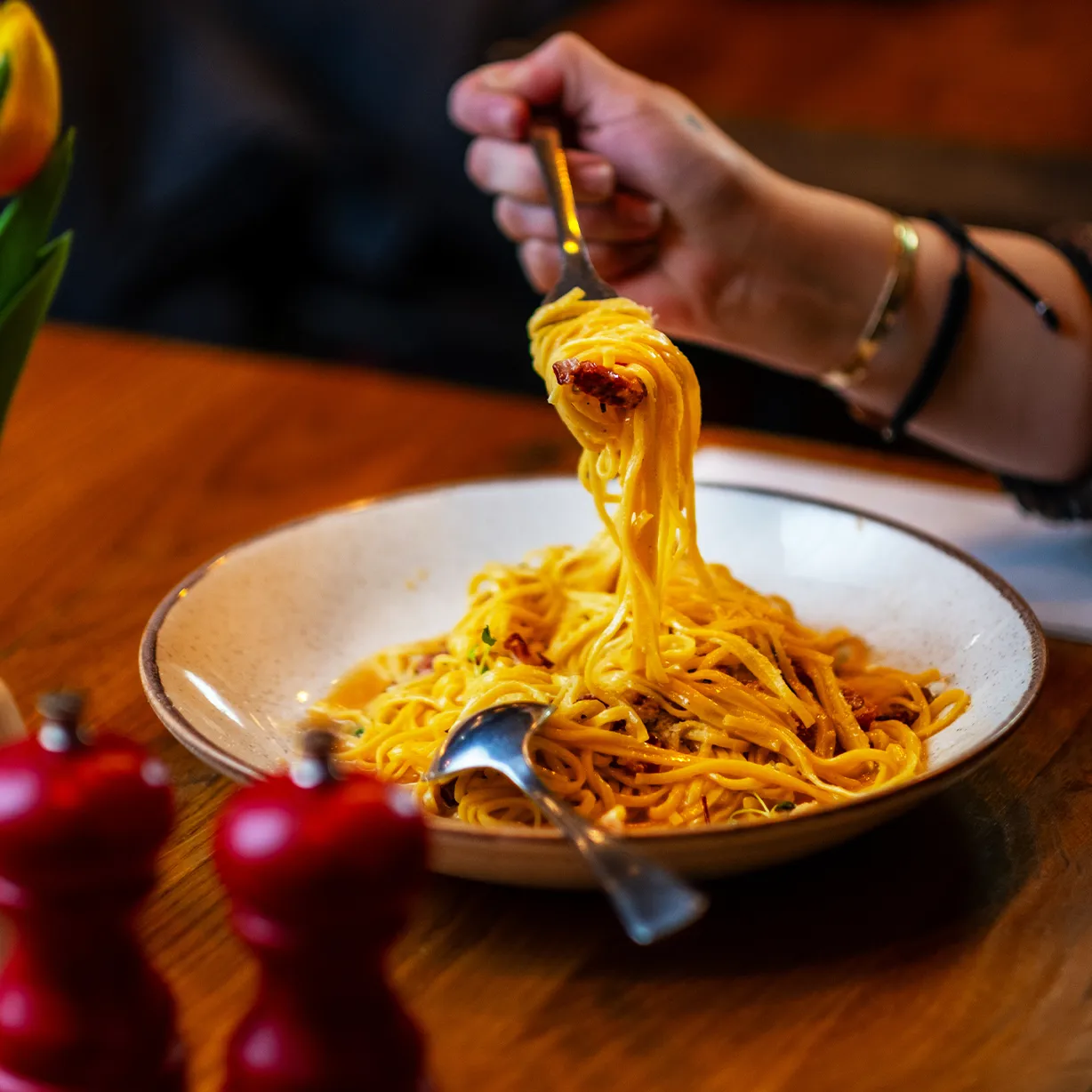 A beautifully plated Mediterranean dinner at La Mela Bistro, offering a taste of authentic flavours in Hackney.